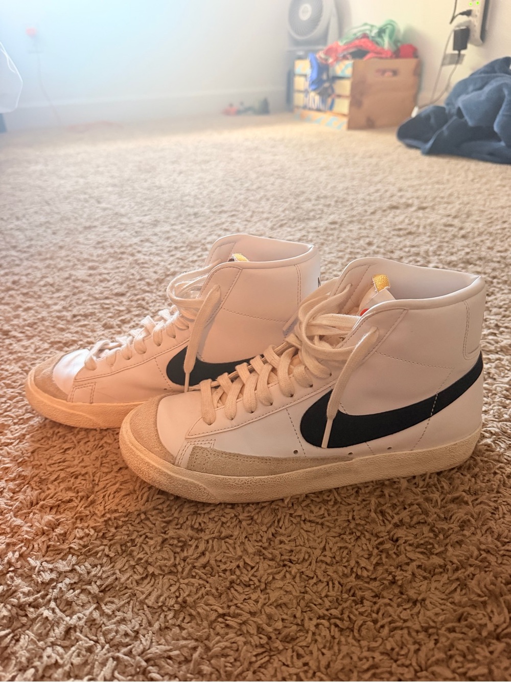 Nike White High-Top Sneakers with Black Swoosh